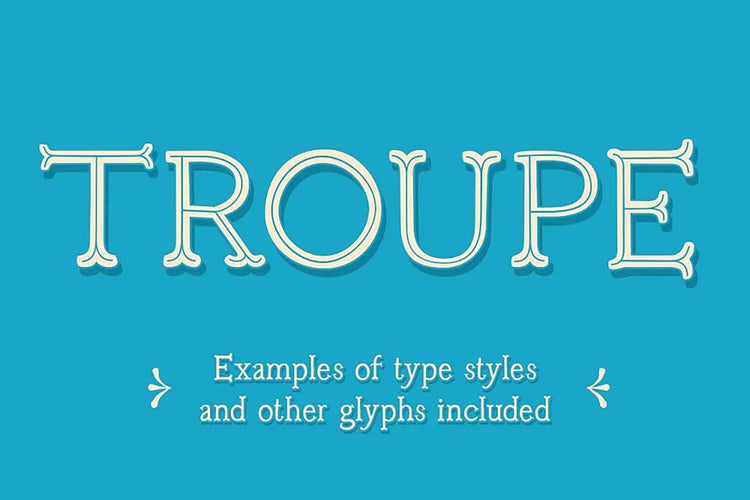 Troupe lettering detail showing playful ornate serifs