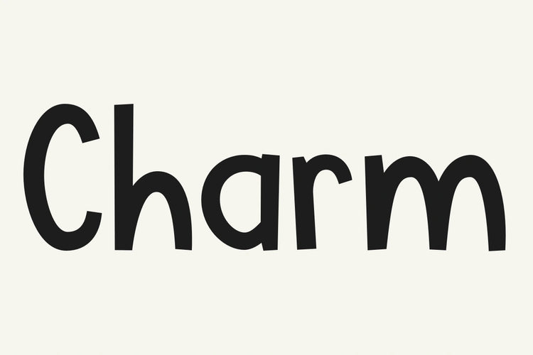 Hunky Dory bold display typeface spelling Charm in black lettering