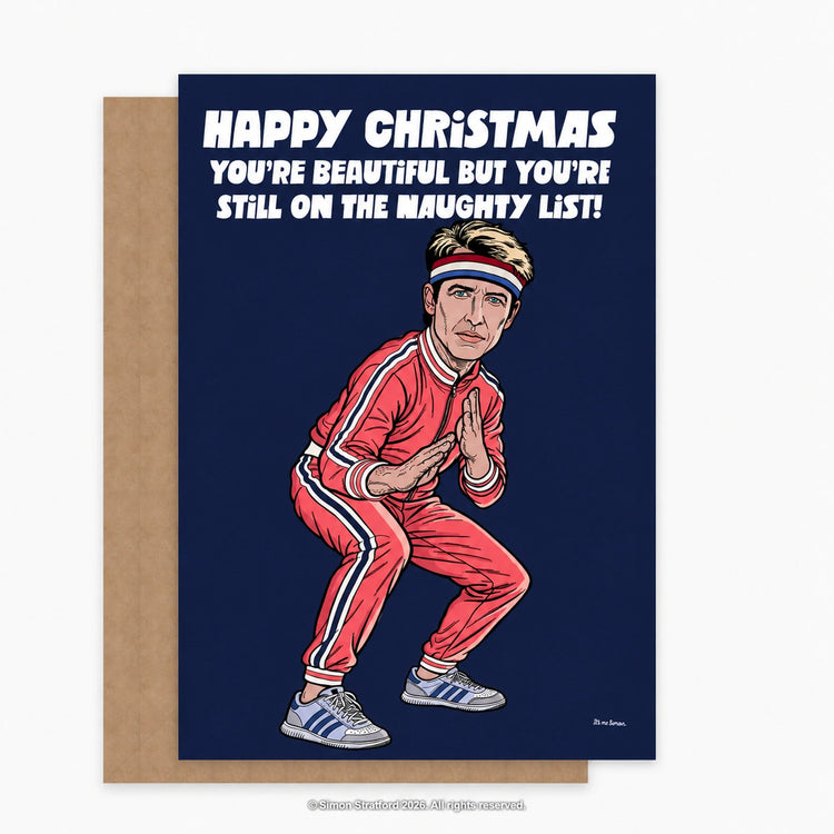 James Blunt Christmas card showing him in a red tracksuit: You’re beautiful but you’re still on the naughty list. Shown with a brown kraft envelope peeking out to the left on a light grey background.