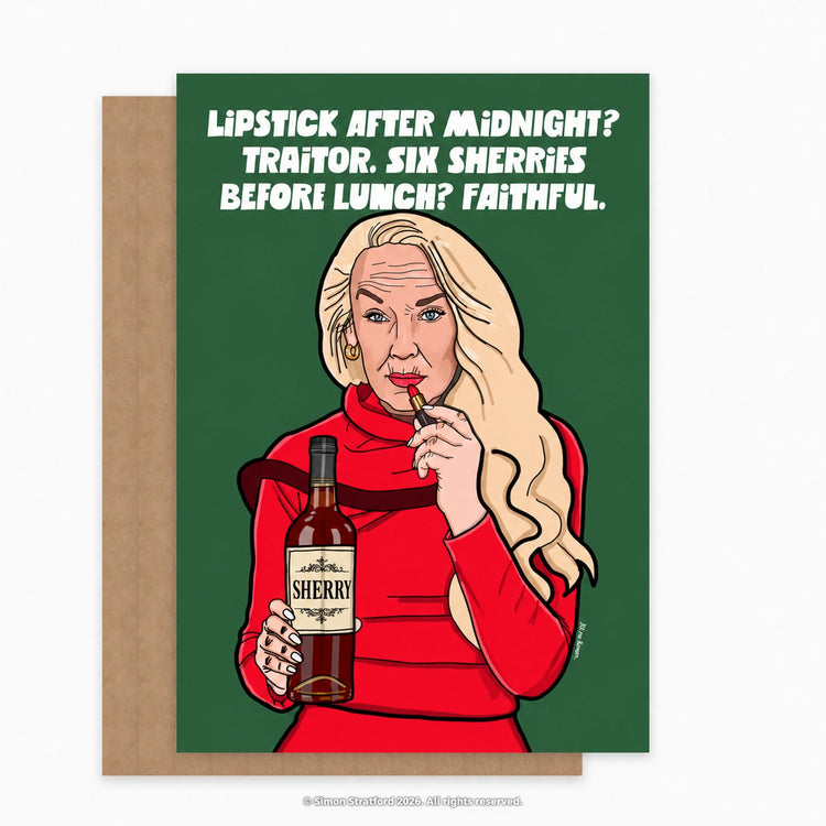 Jerry Hall Christmas card holding sherry and lipstick: Lipstick after midnight? Traitor. Six sherries before lunch? Faithful. Shown with a brown kraft envelope peeking out to the left on a light grey background.