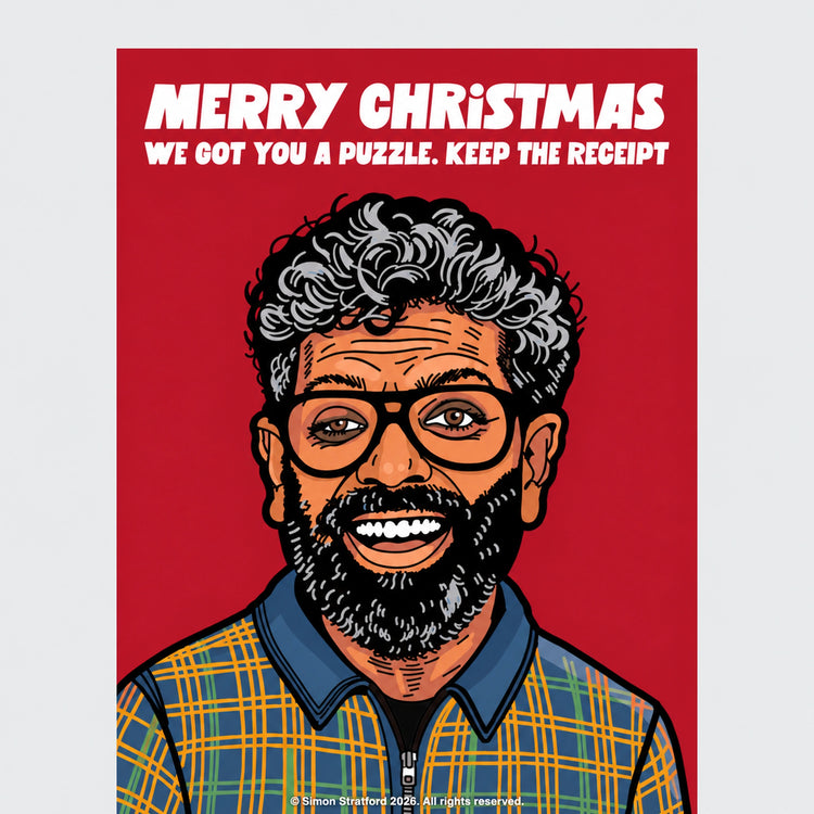 Close-up of Romesh Ranganathan Celebrity Traitors Season Two Christmas card: Merry Christmas. We got you a puzzle. Keep the receipt.