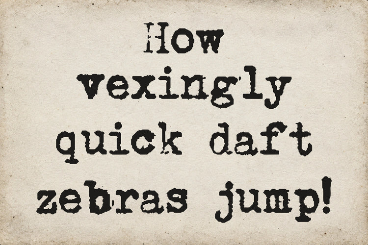Type Old Writer font on aged white paper: How vexingly quick daft zebras jump!