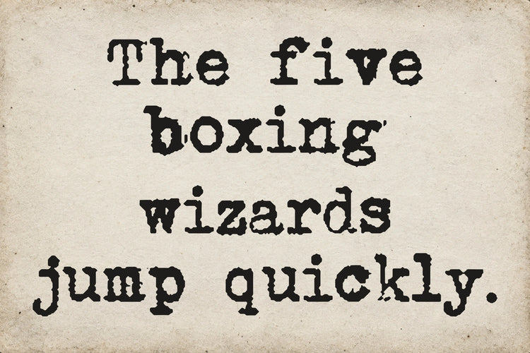 Type Old Writer font on aged white paper: The five boxing wizards jump quickly.